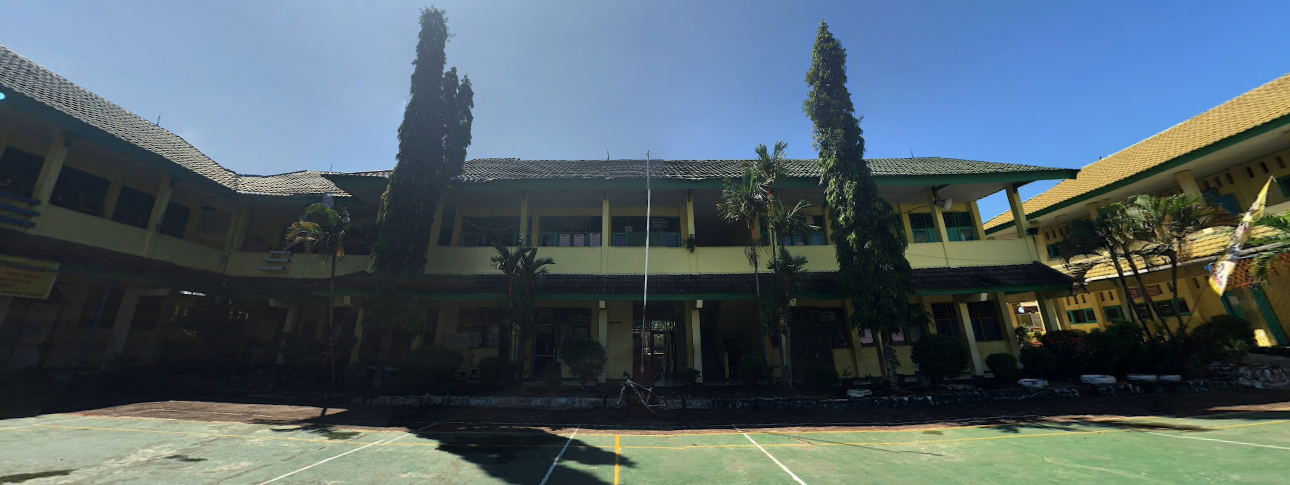 Background image showing a soft-focus school building with trees and blue sky, warm sunlight illuminating the scene