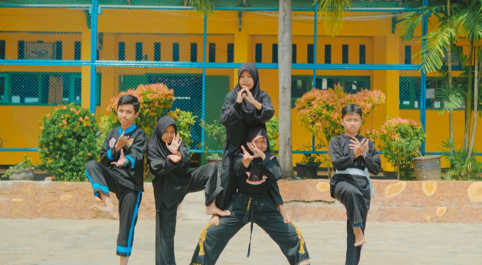 View of Chocolate Hills with green conical hills and blue sky, Bohol, Philippines